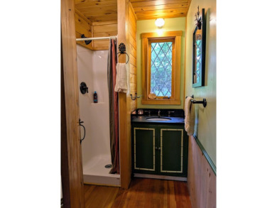 This impeccably maintained, climate-controlled, historic Log on Lucerne In Maine Golf Course in Maine - for sale on GolfHomes.com, golf home, golf lot
