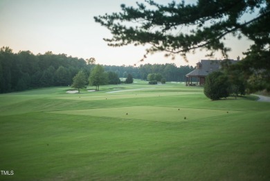 This exceptional home offers luxury living in one of the on Hasentree Club in North Carolina - for sale on GolfHomes.com, golf home, golf lot