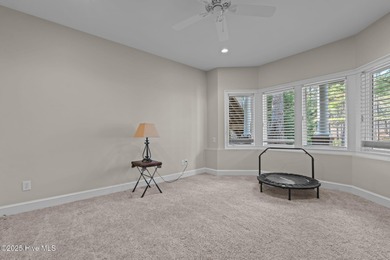 Experience resort-style living every day in this immaculate on Forest Creek Golf Club  in North Carolina - for sale on GolfHomes.com, golf home, golf lot