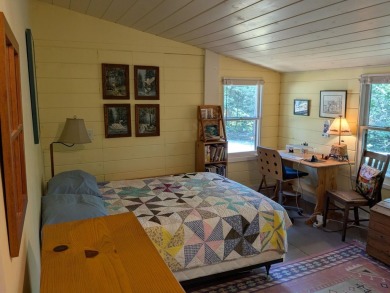 This impeccably maintained, climate-controlled, historic Log on Lucerne In Maine Golf Course in Maine - for sale on GolfHomes.com, golf home, golf lot