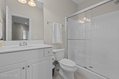 Experience resort-style living every day in this immaculate on Forest Creek Golf Club  in North Carolina - for sale on GolfHomes.com, golf home, golf lot