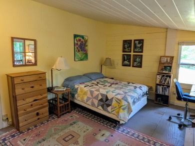 This impeccably maintained, climate-controlled, historic Log on Lucerne In Maine Golf Course in Maine - for sale on GolfHomes.com, golf home, golf lot