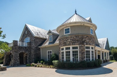 This exceptional home offers luxury living in one of the on Hasentree Club in North Carolina - for sale on GolfHomes.com, golf home, golf lot