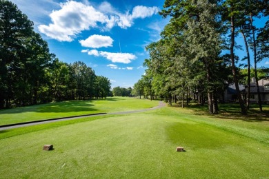 Welcome to this traditional two-story home located on the 7th on Chenal Country Club - Bear Den Mountain in Arkansas - for sale on GolfHomes.com, golf home, golf lot