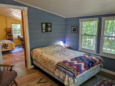 This impeccably maintained, climate-controlled, historic Log on Lucerne In Maine Golf Course in Maine - for sale on GolfHomes.com, golf home, golf lot