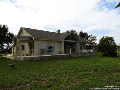 Discover this stunning single-story rock home situated on the on Flying L Guest Ranch in Texas - for sale on GolfHomes.com, golf home, golf lot