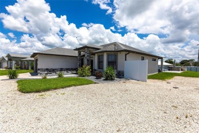 Incredible value in the heart of Cape Coral! This on Palmetto-Pine Country Club in Florida - for sale on GolfHomes.com, golf home, golf lot