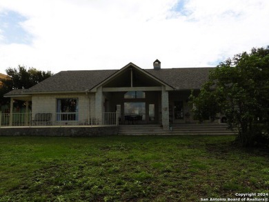 Discover this stunning single-story rock home situated on the on Flying L Guest Ranch in Texas - for sale on GolfHomes.com, golf home, golf lot