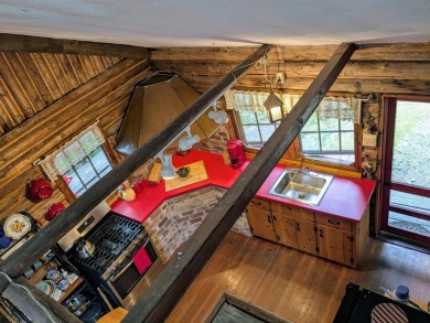 This impeccably maintained, climate-controlled, historic Log on Lucerne In Maine Golf Course in Maine - for sale on GolfHomes.com, golf home, golf lot