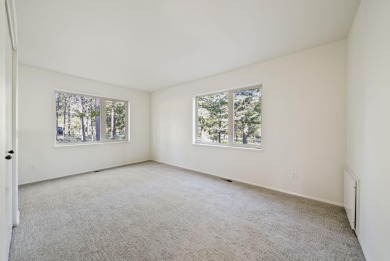 Nestled on a rare double 1/2 acre+ lot overlooking the 16th on Sunriver Woodlands Golf Course in Oregon - for sale on GolfHomes.com, golf home, golf lot