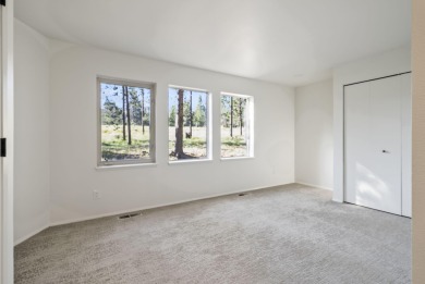 Nestled on a rare double 1/2 acre+ lot overlooking the 16th on Sunriver Woodlands Golf Course in Oregon - for sale on GolfHomes.com, golf home, golf lot