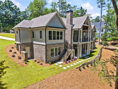 An amazing elevated lifestyle awaits you in this impeccably on Reynolds Lake Oconee - The Oconee in Georgia - for sale on GolfHomes.com, golf home, golf lot