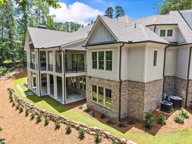 An amazing elevated lifestyle awaits you in this impeccably on Reynolds Lake Oconee - The Oconee in Georgia - for sale on GolfHomes.com, golf home, golf lot