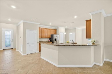 Welcome Home:
Step inside this inviting 4-bedroom, 3 Bath on Valencia Golf and Country Club in Florida - for sale on GolfHomes.com, golf home, golf lot