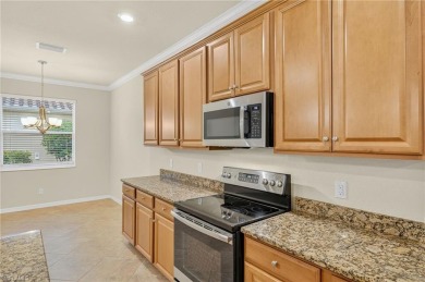 Welcome Home:
Step inside this inviting 4-bedroom, 3 Bath on Valencia Golf and Country Club in Florida - for sale on GolfHomes.com, golf home, golf lot