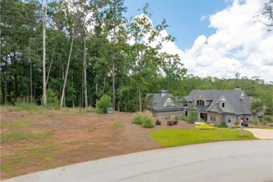 Tucked in a peaceful cove, this exceptional lakefront home site on Reynolds Lake Oconee - The Oconee in Georgia - for sale on GolfHomes.com, golf home, golf lot