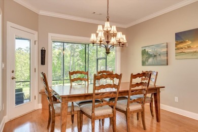 Views of The Reserve's Signature Hole, with golf and lake!  This on The Reserve Club At Woodside Plantation in South Carolina - for sale on GolfHomes.com, golf home, golf lot