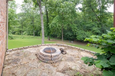 This immaculately maintained all brick home is so private yet on Big Sugar Golf Club in Arkansas - for sale on GolfHomes.com, golf home, golf lot
