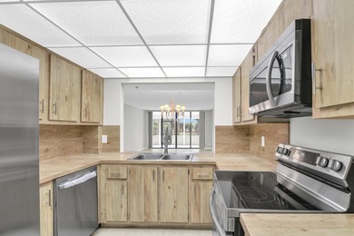 Don't miss this centrally located ground floor apartment with on The Country Club At Boca Raton in Florida - for sale on GolfHomes.com, golf home, golf lot