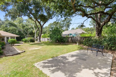 Welcome to this beautifully updated home nestled in a peaceful on Diamondhead Country Club in Mississippi - for sale on GolfHomes.com, golf home, golf lot
