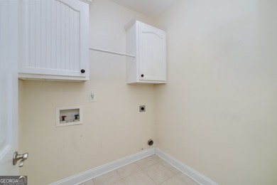 This beautiful, custom built Ranch is located in the Lake Dow on Canongate At Georgia National Golf Club in Georgia - for sale on GolfHomes.com, golf home, golf lot