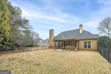 This beautiful, custom built Ranch is located in the Lake Dow on Canongate At Georgia National Golf Club in Georgia - for sale on GolfHomes.com, golf home, golf lot