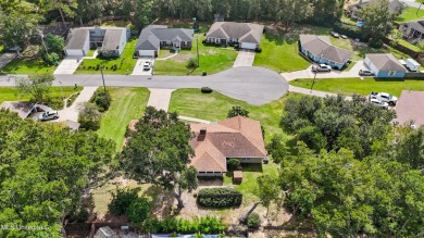 Welcome to this beautifully updated home nestled in a peaceful on Diamondhead Country Club in Mississippi - for sale on GolfHomes.com, golf home, golf lot