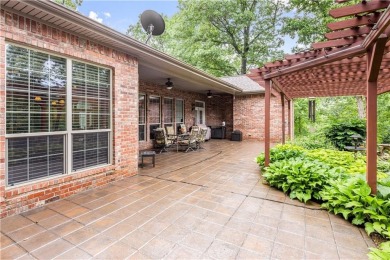 This immaculately maintained all brick home is so private yet on Big Sugar Golf Club in Arkansas - for sale on GolfHomes.com, golf home, golf lot