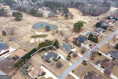 This beautiful, custom built Ranch is located in the Lake Dow on Canongate At Georgia National Golf Club in Georgia - for sale on GolfHomes.com, golf home, golf lot