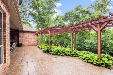 This immaculately maintained all brick home is so private yet on Big Sugar Golf Club in Arkansas - for sale on GolfHomes.com, golf home, golf lot