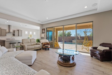 Welcome to this highly upgraded, meticulously maintained home in on Poston Butte Golf Club in Arizona - for sale on GolfHomes.com, golf home, golf lot