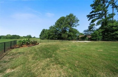 Welcome to the 7th Green on Honey Creek! With the sun setting on Honey Creek Country Club in Georgia - for sale on GolfHomes.com, golf home, golf lot