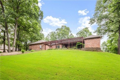 This immaculately maintained all brick home is so private yet on Big Sugar Golf Club in Arkansas - for sale on GolfHomes.com, golf home, golf lot