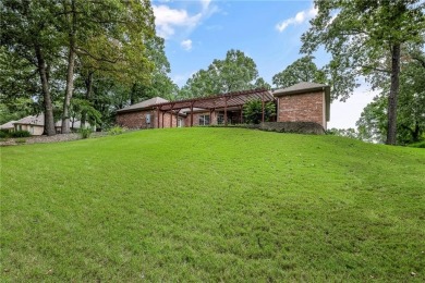 This immaculately maintained all brick home is so private yet on Big Sugar Golf Club in Arkansas - for sale on GolfHomes.com, golf home, golf lot