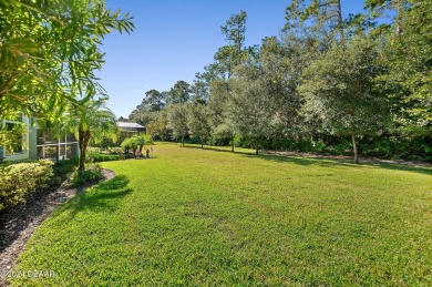 This beautiful home offers many upgrades for all your living on Plantation Bay Golf and Country Club in Florida - for sale on GolfHomes.com, golf home, golf lot