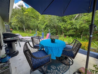 Presenting a warm and inviting 3 bedrooms, 2 bath home located on Summertree Golf Course in Florida - for sale on GolfHomes.com, golf home, golf lot