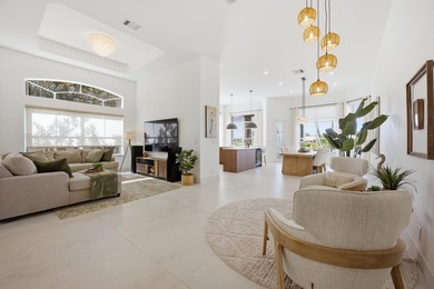 Located on the 11th hole in Aberdeen Golf & Country Club, this on Aberdeen Golf and Country Club in Florida - for sale on GolfHomes.com, golf home, golf lot