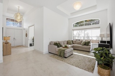 Located on the 11th hole in Aberdeen Golf & Country Club, this on Aberdeen Golf and Country Club in Florida - for sale on GolfHomes.com, golf home, golf lot