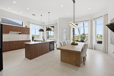 Located on the 11th hole in Aberdeen Golf & Country Club, this on Aberdeen Golf and Country Club in Florida - for sale on GolfHomes.com, golf home, golf lot