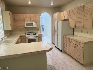 WELL KEPT TOWNHOUSE WITH AWESOME VIEWS OF THE POND IN A GUARD on Spanish Trail Golf and Country Club in Nevada - for sale on GolfHomes.com, golf home, golf lot