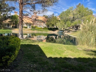 WELL KEPT TOWNHOUSE WITH AWESOME VIEWS OF THE POND IN A GUARD on Spanish Trail Golf and Country Club in Nevada - for sale on GolfHomes.com, golf home, golf lot