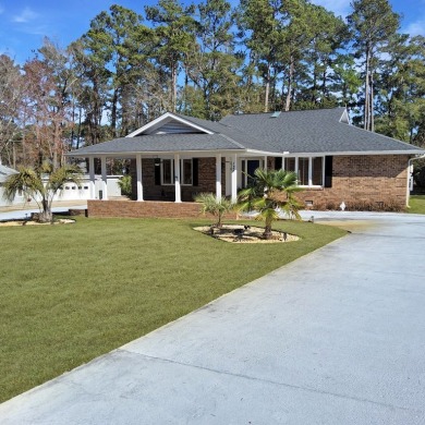 This 2,674 sq ft ranch-style brick home in the gated Santee on Santee-Cooper Country Club in South Carolina - for sale on GolfHomes.com, golf home, golf lot