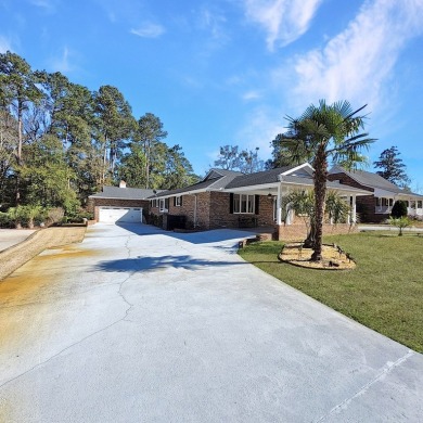 This 2,674 sq ft ranch-style brick home in the gated Santee on Santee-Cooper Country Club in South Carolina - for sale on GolfHomes.com, golf home, golf lot