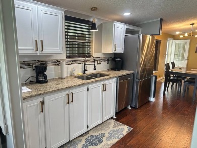 LOCATED IN HIGHLY SOUGHT FIVE-STAR COMMUNITY FOUR LAKES GOLF on Four Lakes Golf Club in Florida - for sale on GolfHomes.com, golf home, golf lot