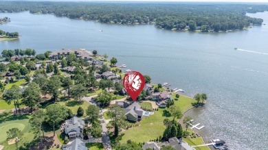Experience panoramic views of Lake Oconee from this stunning on The Golf Club at Cuscowilla in Georgia - for sale on GolfHomes.com, golf home, golf lot