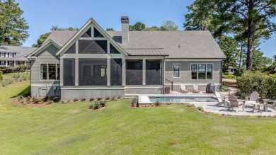 Experience panoramic views of Lake Oconee from this stunning on The Golf Club at Cuscowilla in Georgia - for sale on GolfHomes.com, golf home, golf lot
