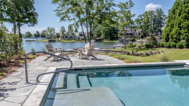 Experience panoramic views of Lake Oconee from this stunning on The Golf Club at Cuscowilla in Georgia - for sale on GolfHomes.com, golf home, golf lot