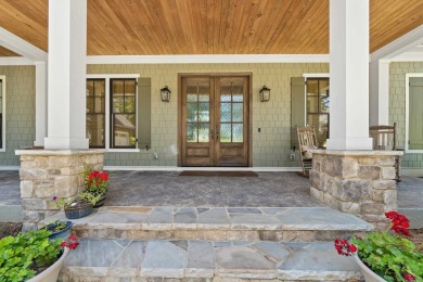 Experience panoramic views of Lake Oconee from this stunning on The Golf Club at Cuscowilla in Georgia - for sale on GolfHomes.com, golf home, golf lot