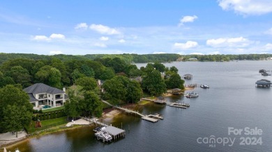 Nestled along the pristine shores of Lake Norman, this on The Peninsula Club in North Carolina - for sale on GolfHomes.com, golf home, golf lot