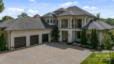 Nestled along the pristine shores of Lake Norman, this on The Peninsula Club in North Carolina - for sale on GolfHomes.com, golf home, golf lot